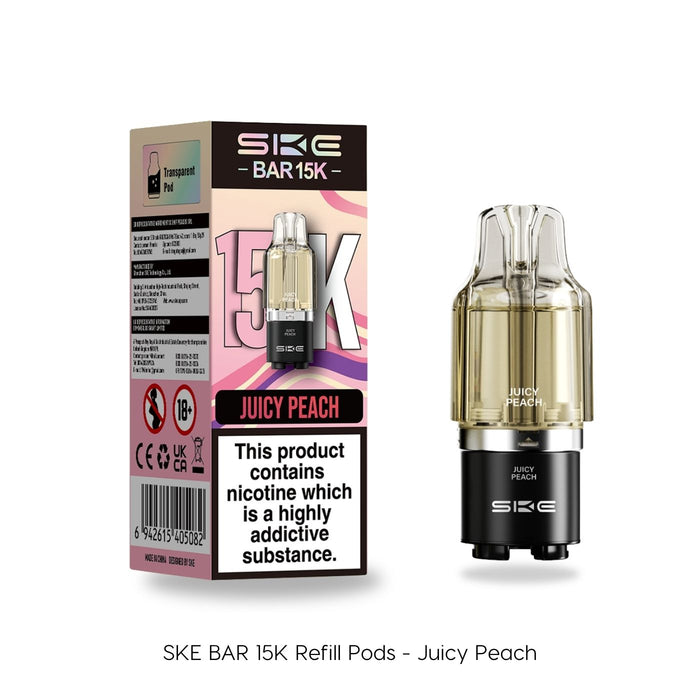 A Juicy Peach - SKE Bar 15K Refill Pod by SKE Crystal is displayed next to its packaging, featuring peach flavor details, a 15,000 puff count, and a transparent window showing the refill pod inside. Available at Vape Direct In Milton Keynes